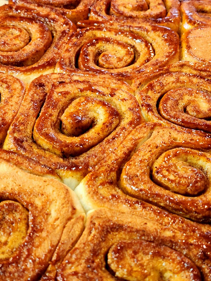 services-05 Freshly baked cinnamon rolls with warm, sweet aroma perfect for breakfast or dessert.